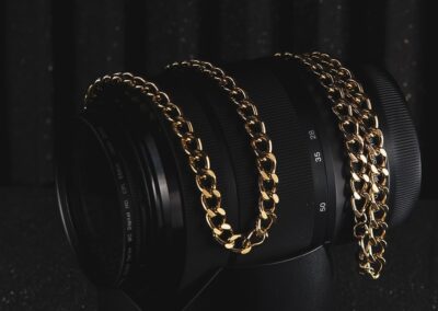 silver bracelet on black surface