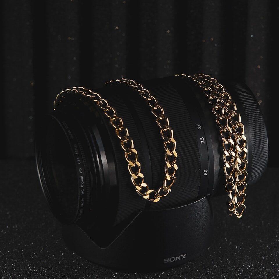 silver bracelet on black surface